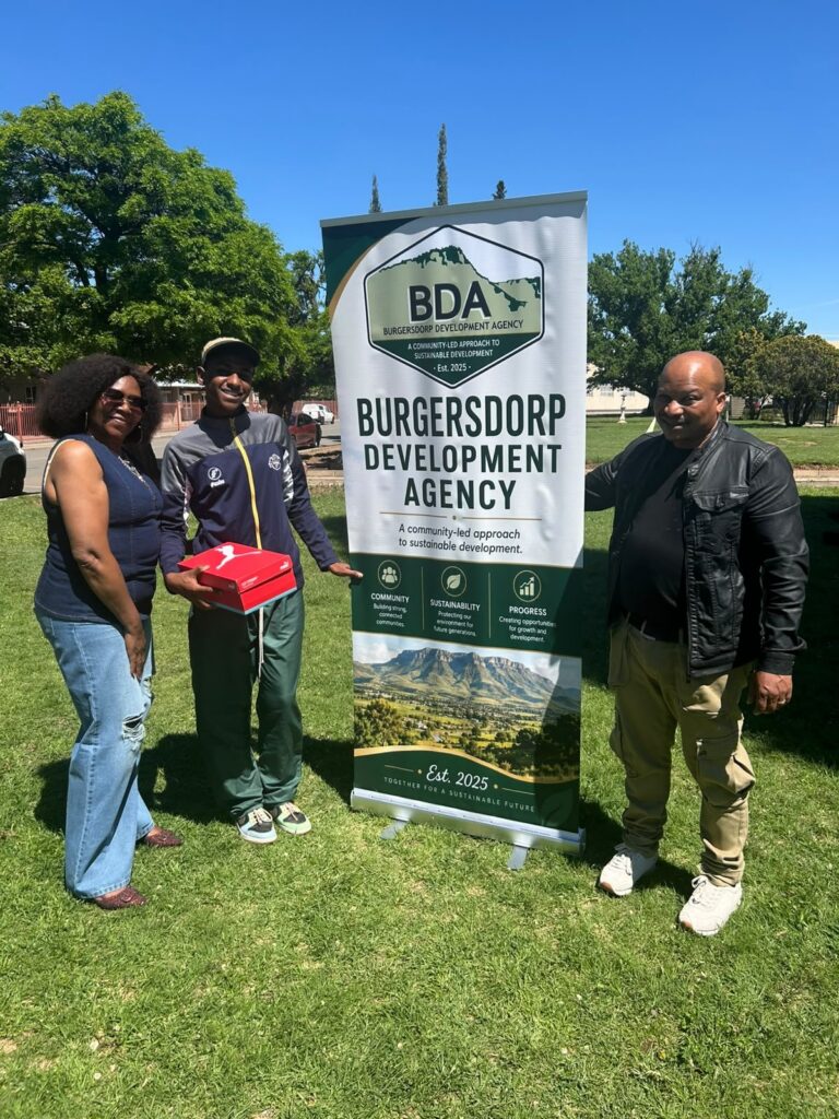 The player receiving his sponsorship at the handover